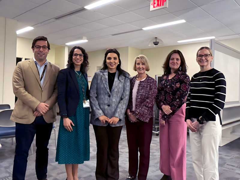 Rana Amayreh stands with V C U pharmacy faculty and advisors after defending dissertation